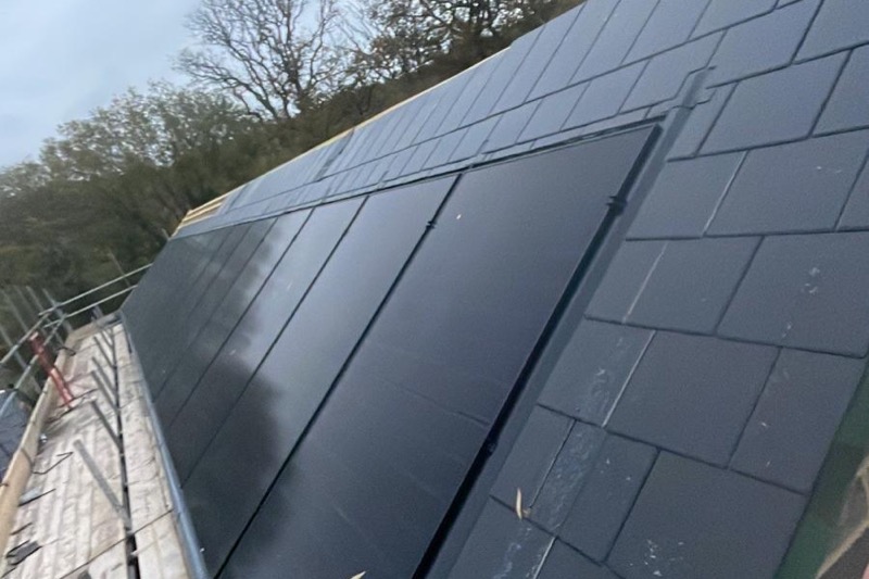 QPH Roofing solar panel installation on pitched slate roof in South England